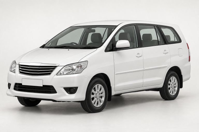 White Toyota Innova taxi in Mysore